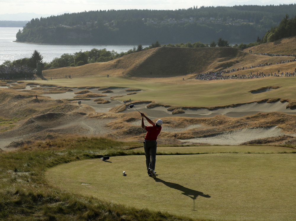 Jordan Spieth watches his tee shot on the 14th hole during the third round of the U.S. Open golf tournament at Chambers Bay on Saturday, June 20, 2015 in University Place, Wash.