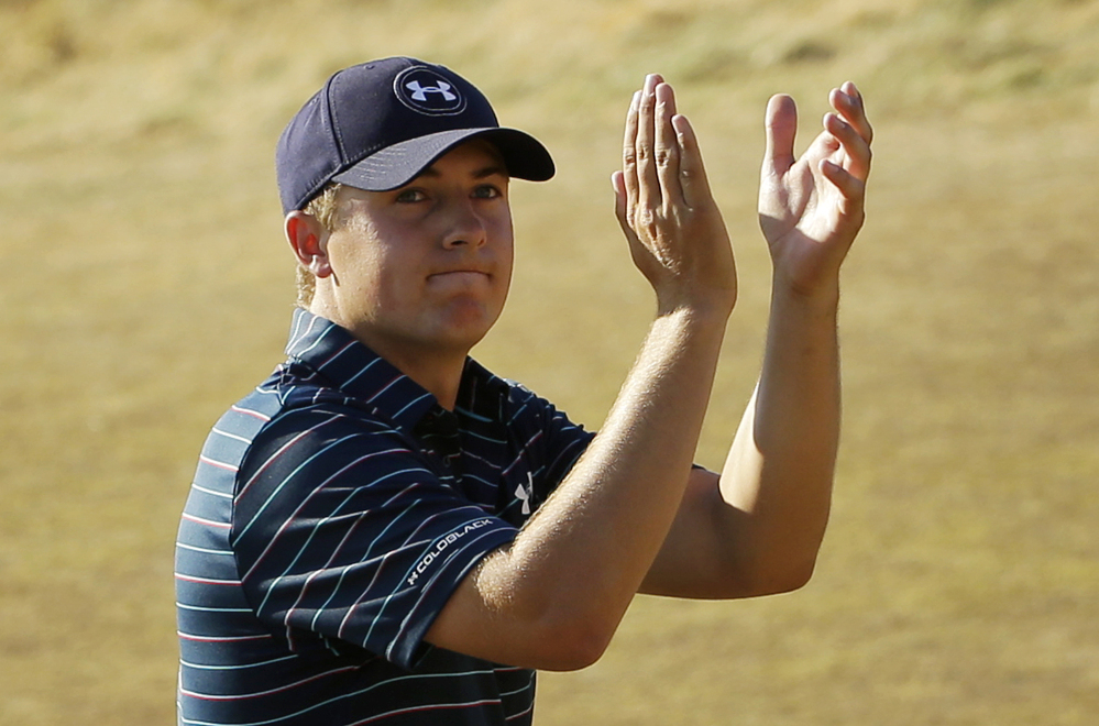 Jordan Spieth claps after finishing the final round of the U.S. Open golf tournament at Chambers Bay on Sunday, June 21, 2015 in University Place, Wash. Spieth won the championship.