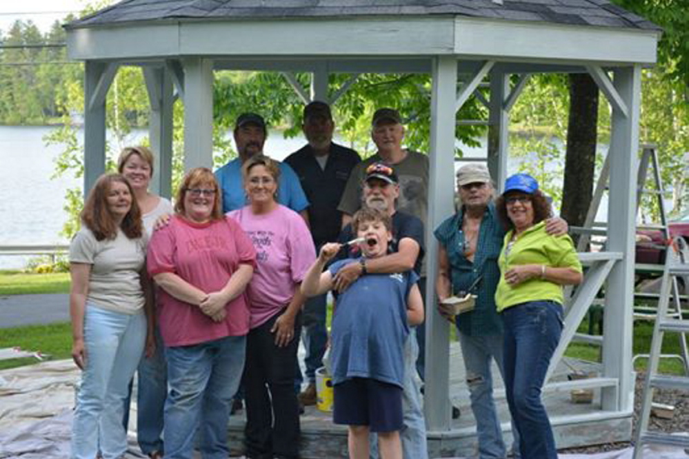 In front, from left, are Mercy Smith, Sue Fournier, Dee Robinson, Kathy Hargreaves, Leon Volinsky, with grandson Julin, and Mac and Donna MacIsaac. In back, from left, are Roderick Smith, Frank Robinson and County Director Tim Fournier.