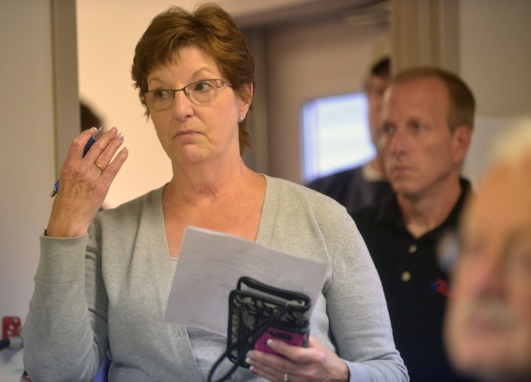 Judith Irving speaks during a public hearing on town budget items Tuesday in Clinton.