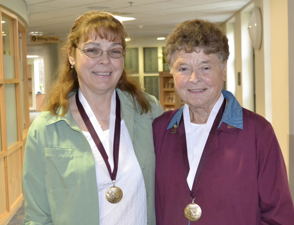 Franklin Health Care Support Nurse Nancy Thomas recently presented the Goslin Medal award to Joanne Stinneford, right, and her daughter Debra Vining for living well with insulin-dependent diabetes for more than 50 years. Ryan Stinneford was also recognized, but unable to attend the small ceremony at Franklin Memorial Hospital to honor this distinction for conscientious and courageous attention to the many challenging details involved in managing diabetes.