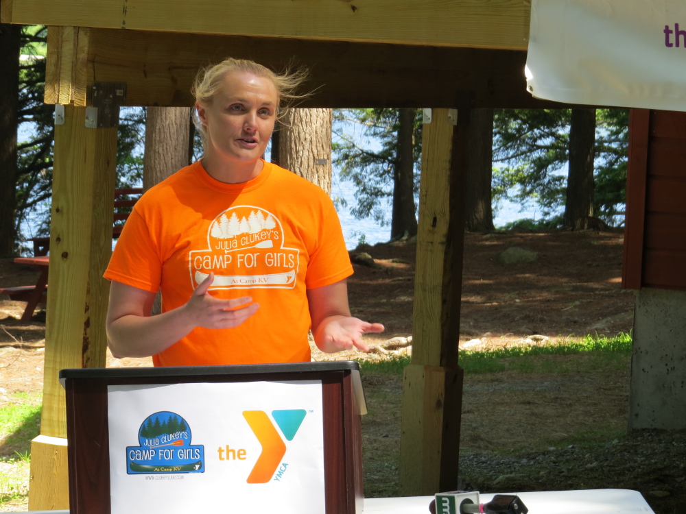Olympian Julia Clukey speaks at the ribbon cutting ceremony for the new director’s cabin at Julia Clukey’s Camp for Girls at Camp KV. Camp opened Wednesday, June 17, for more than 100 young girls.