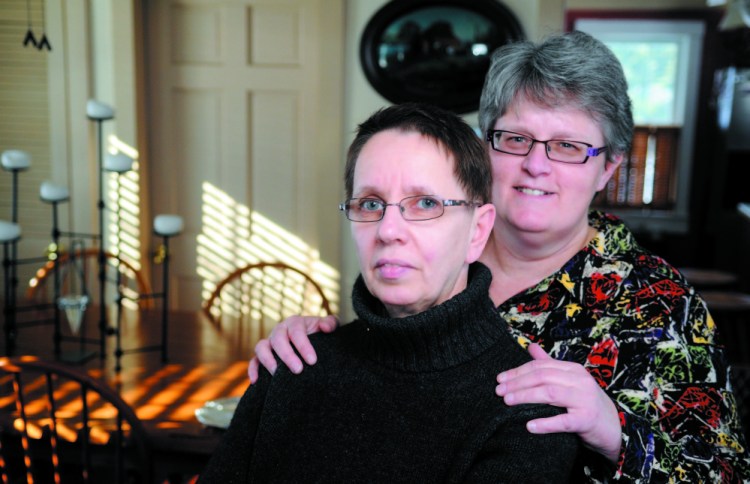 Brenda Adler, left, and Melody Main, shown here in a file photo, were married a year ago in Maine following the 2012 passage of a law allowing same-sex couples to marry. On Friday, the Supreme Court struck down state bans on same-sex marriage, opening the door for gay couples in all states to marry.