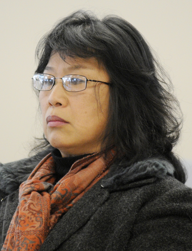 Jennifer Ma Sims, of East Winthrop, is shown at the Maine Human Rights Commission hearing in December 2013, when the commission voted 3-1 to find reasonable grounds to believe the former payroll and benefits clerk in the Winthrop and Fayette school system was subjected to illegal workplace discrimination and retaliation.