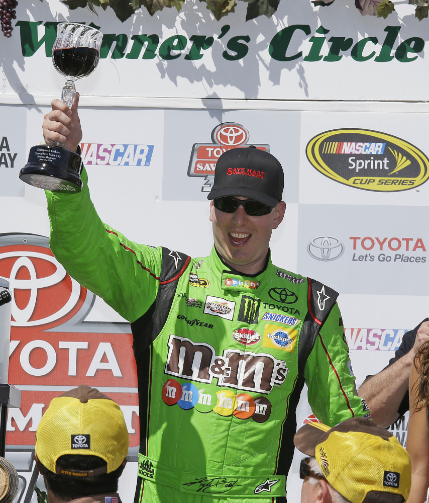 Kyle Busch celebrates Sunday after winning the NASCAR Sprint Cup Series race in Sonoma, Calif.