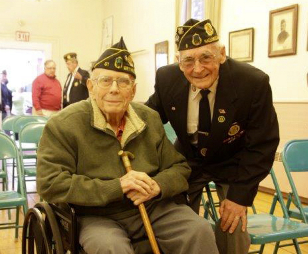 The Goodrich-Caldwell Legion Post 6 in Hallowell recently had the honor to present 95-year-old Kenneth H. Ramage, left, 70 year membership in the American Legion award. Presenting the award to Ramage, a World War II veteran, was Post Commander, Gerald Stuart, and Maine District Commander, Donald Chase. Ramage was also presented with the Eagle Cane by Bert Truman, right, and a vial of sand from Normandy’s Omaha Beach.