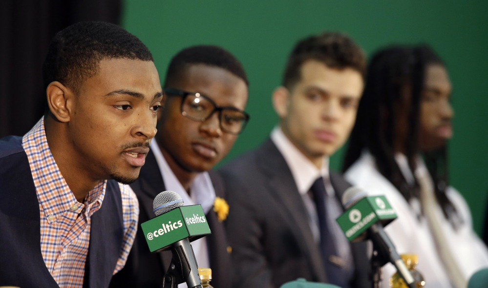AP photo 
 Boston Celtics draft pick Jordan Mickey, left, responds to a question as draft picks Terry Rozier, second from left, R.J. Hunter and Marcus Thornton look on during a media introduction Tuesday at the Celtics training facility in Waltham, Mass.