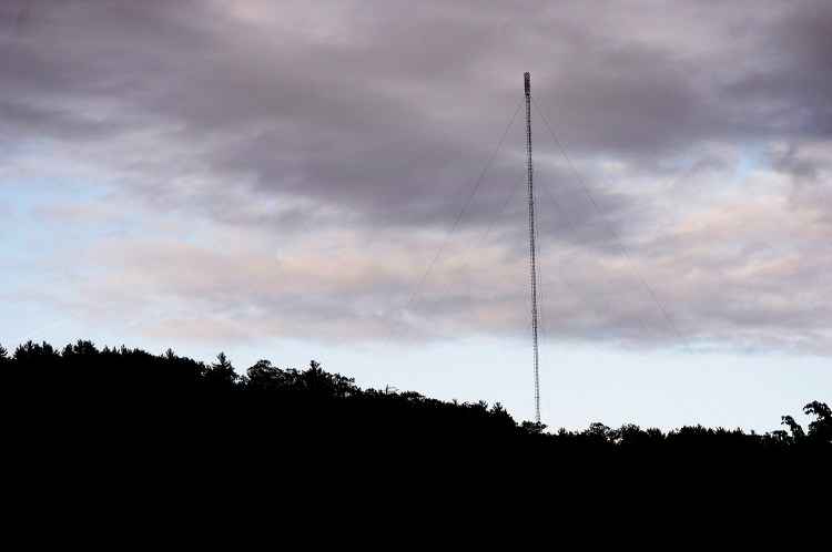 WMEA-FM went off the air Monday because a 1,600-foot transmission line overheated. The line, which runs from a transmitter to the top of this 1,500-foot tower atop Winn Mountain in Sebago, had corroded over time.
 Shawn Patrick Ouellette/Staff Photographer