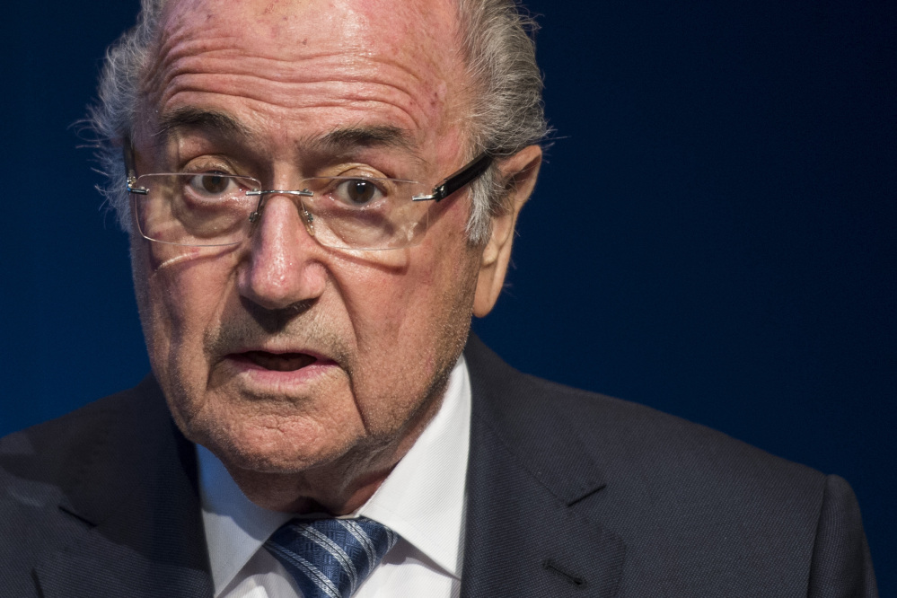 FIFA President Sepp Blatter speaks at a news conference Tuesday at FIFA headquarters in Zurich, Switzerland. He said he will resign and promised to call for new elections to choose his successor.