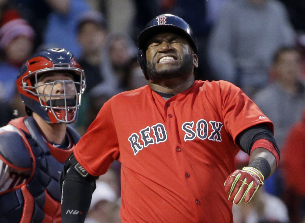 David Ortiz grimaces after fouling the ball off his foot in the fourth inning of Wednesday night’s game. The Red Sox got shut out and split a day-night doubleheader.