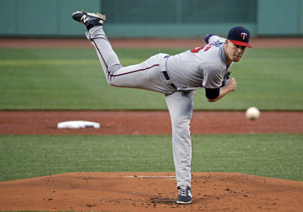Minnesota Twins starting pitcher Trevor May allowed just two hits in seven innings Wednesday night to beat the punchless Red Sox, 2-0.