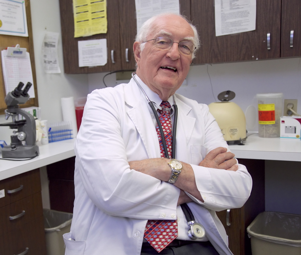 Dr. Jack Lewis, who turns 81 this week, has his physician son watching for mistakes as Lewis sees up to 30 patients a day. “If I made a mistake, I’d be the first one to quit here,” he said.