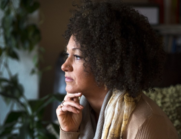 Rachel Dolezal is stepping down as president of the Spokane chapter of the NAACP after her family said she is white and that she has falsely portrayed herself as black.
