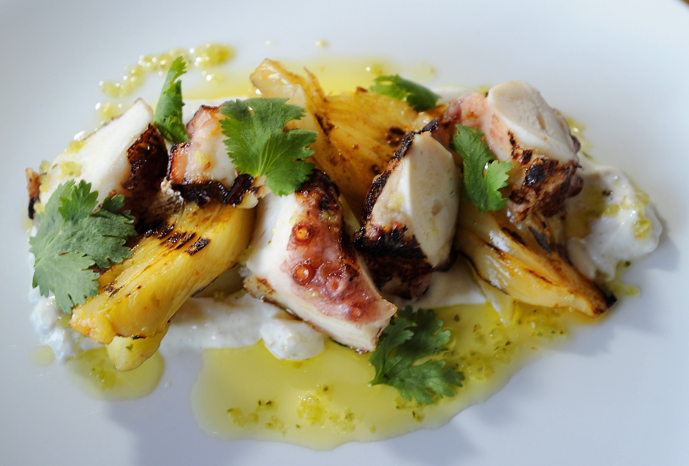 Grilled octopus with fennel, fingerlings, preserved lemon yogurt and salsa verde.