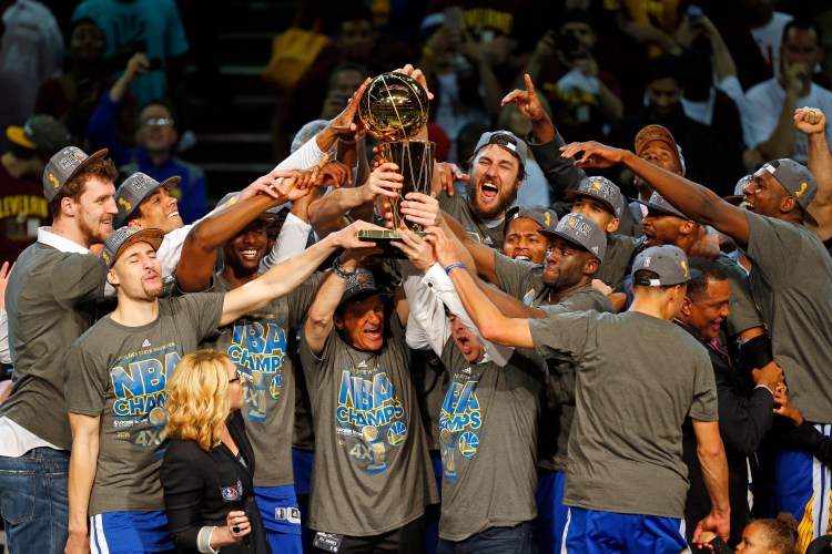 The Golden State Warriors celebrate after winning the NBA title against the Cleveland Cavaliers on Tuesday night. The Warriors defeated the Cavaliers, 105-97, to win the best-of-seven game series 4-2.
The Associated Press