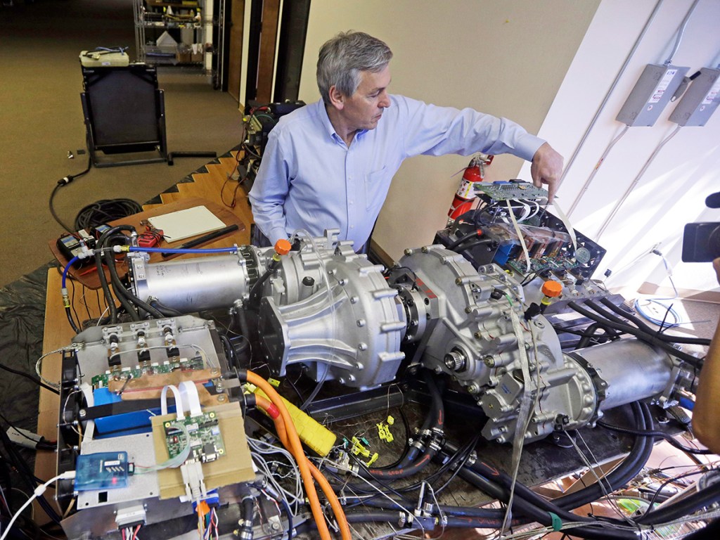 Wrightspeed's Ian Wright explains the technology behind an electric-powered engine that will be used for FedEx delivery trucks. The Associated Press
