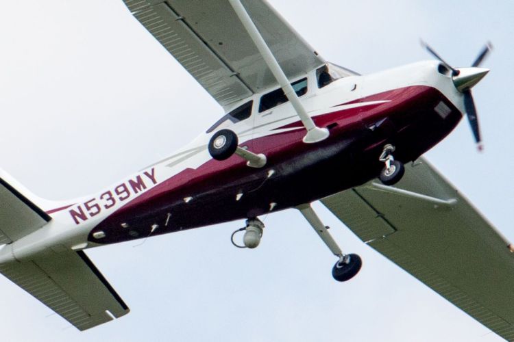 In this photo taken May 26, 2015, a small plane flies near Manassas Regional Airport in Manassas, Va. The plane is among a fleet of FBI surveillance aircraft that are primarily used to target suspects under federal investigation. Such planes are capable of taking video of the ground, and some can sweep up certain identifying cellphone data. The Associated Press