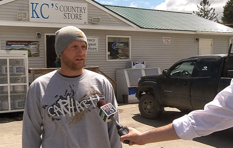 Robert Burton, shown giving a TV interview shortly after the discovery of the body of his girlfriend in her Parkman home in June, has turned himself in to police. Courtesy of WABI-TV via Maine Department of Public Safety