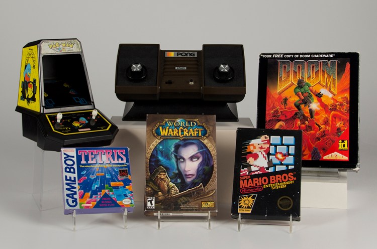 The six games inducted into the new Video Game Hall of Fame on June 4, 2015 include (clockwise from top left):  Pac-Man, Pong, Doom, Super Mario Bros., World of Warcraft and Tetris. 