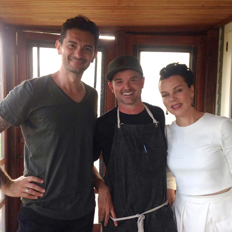 Jason Williams, center, chef at The Well at Jordan's Farm in Cape Elizabeth, with Cooking Channel hosts Debi Mazar, right, and Gabriele Corcos. 