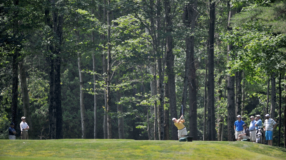 Mark Plummer tees off on the 17th hole in the first round of the Maine Amateur Championship on Tuesday at Waterville Country Club in Oakland.