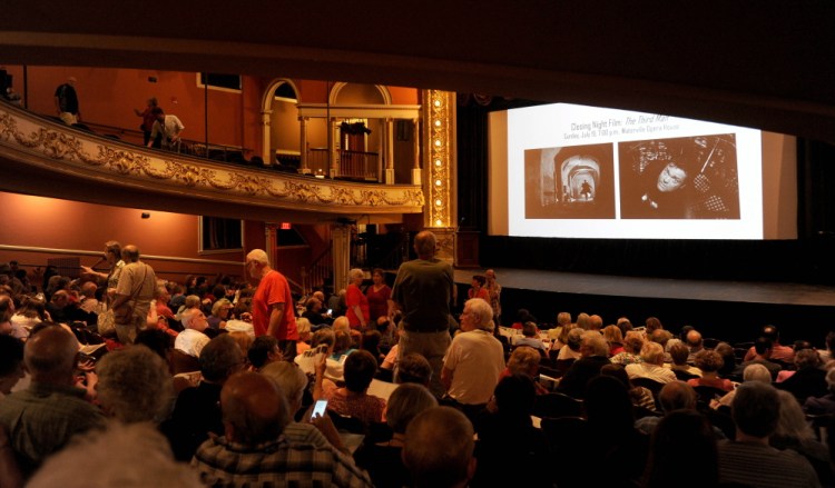People take their seats Friday night in the Waterville Opera House for the showing of “Tumbledown” during the opening night of the Maine International Film Festival in Waterville.