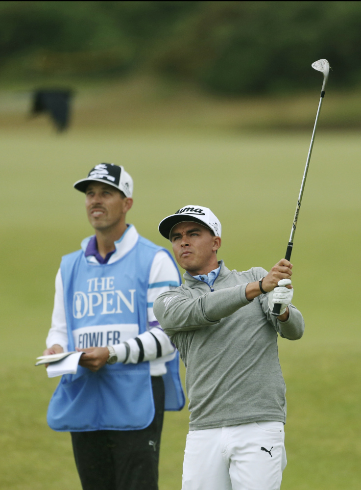 Rickie Fowler follows a shot during a practice round for the British Open at the Old Course, St. Andrews, Scotland on Tuesday.