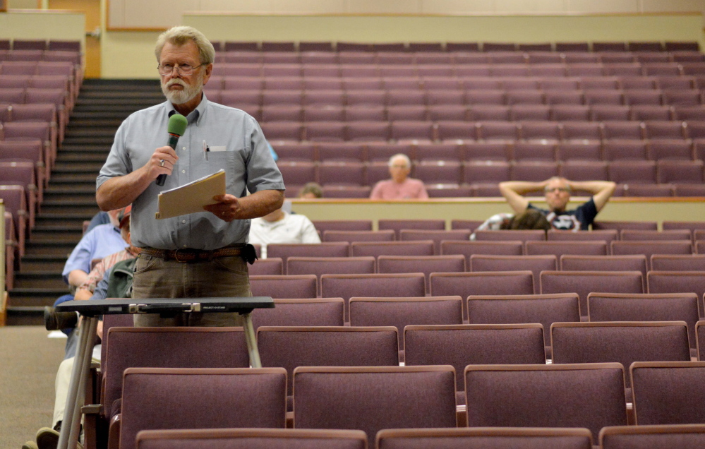Tim Russell, of Sidney, speaks on June 18 during a Regional School Unit 18 district budget meeting at Messalonskee High School.