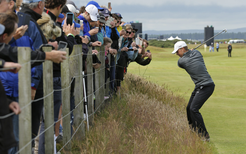AP photo 
 Jordan Spieth plays from the rough on hole 16 during a practice round Wednesday  at the British Open Golf Championship at the Old Course, St. Andrews, Scotland.