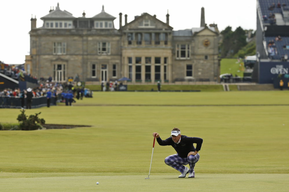 AP photo 
 England’s Ian Poulter lines up a putt on the first green during the first round of the British Open Golf Championship Thursday at the Old Course, St. Andrews, Scotland. The size of the green on the first hole was one of the things that stood out most to Waterville County Club pro Don Roberts when he played the course in 1985.