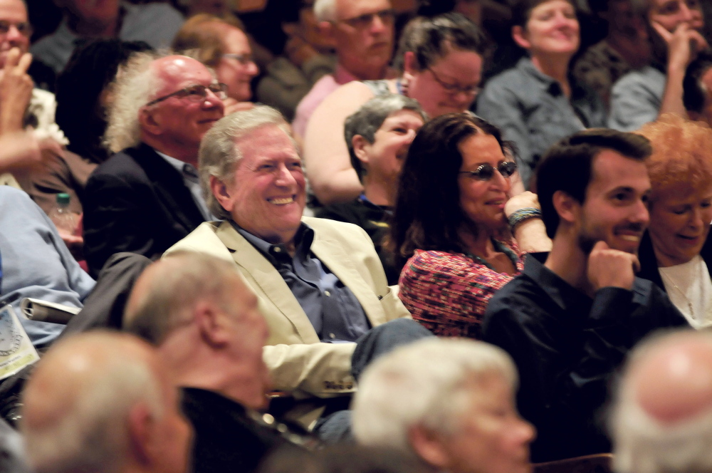 Actor Michel Murphy, center, laughs on Thursday with members of the audience who came to see his movie “Fall” prior to Murphy being awarded the Mid-Life Achievement Award during a Maine International Film Festival event in Waterville.