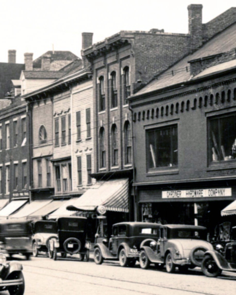This 1931 file photo of Water Street in Gardiner shows buildings that had been damaged in a recent fire.
