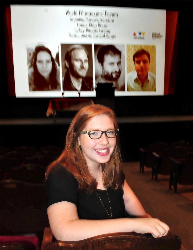 Caroline Wheeler sits in the Waterville Opera House on Saturday as people arrive to view entries in the 38th Maine Student Film and Video Festival. Wheeler, a student at Waterville Senior High School, received an honorable mention as director of her entry, “Three.”