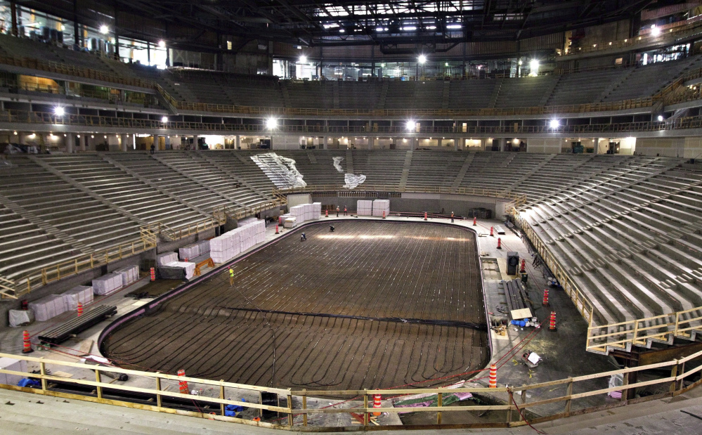 AP photo 
 In this Sept. 26, 2014, file photo, work continues on the the Videotron Centre in Quebec City. The NHL is one step closer to establishing expansion teams in Las Vegas and Quebec City.