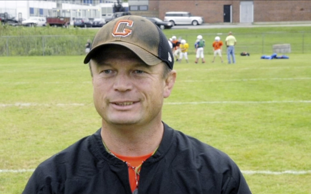 Former Gardiner Area High School football coach Burgess poses during a 2013 practice. Burgess resigned recently to take a position at Bridgton Academy.