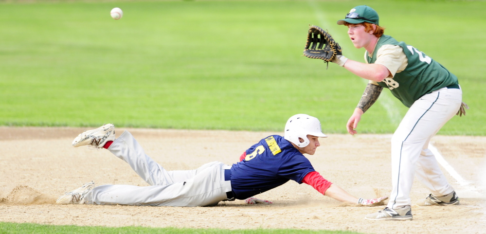 Augusta baserunner Justin Rodrigue dives back in time to beat a pick-off throw to Bessey first basemen Emery Chickering during a Zone 2 American Legion playoff game Thursday at McGuire Field in Augusta.