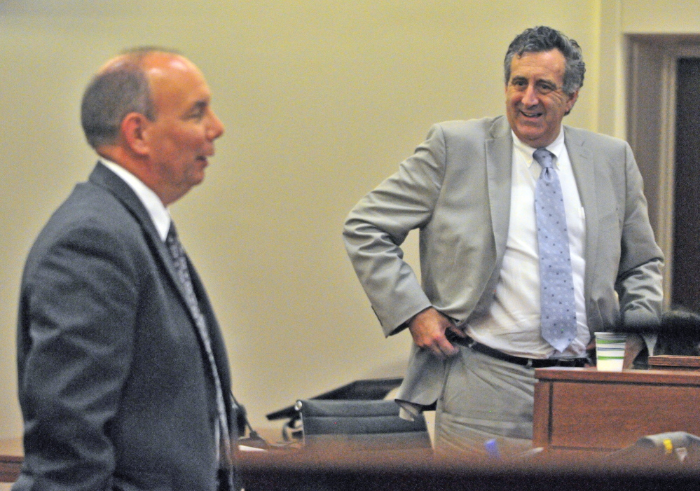 Assistant Attorney General Paul Rucha, left, and defense attorney Ronald Bourget argue during a Eric Bard’s sentencing hearing on Friday in the Capital Judicial Center in Augusta.