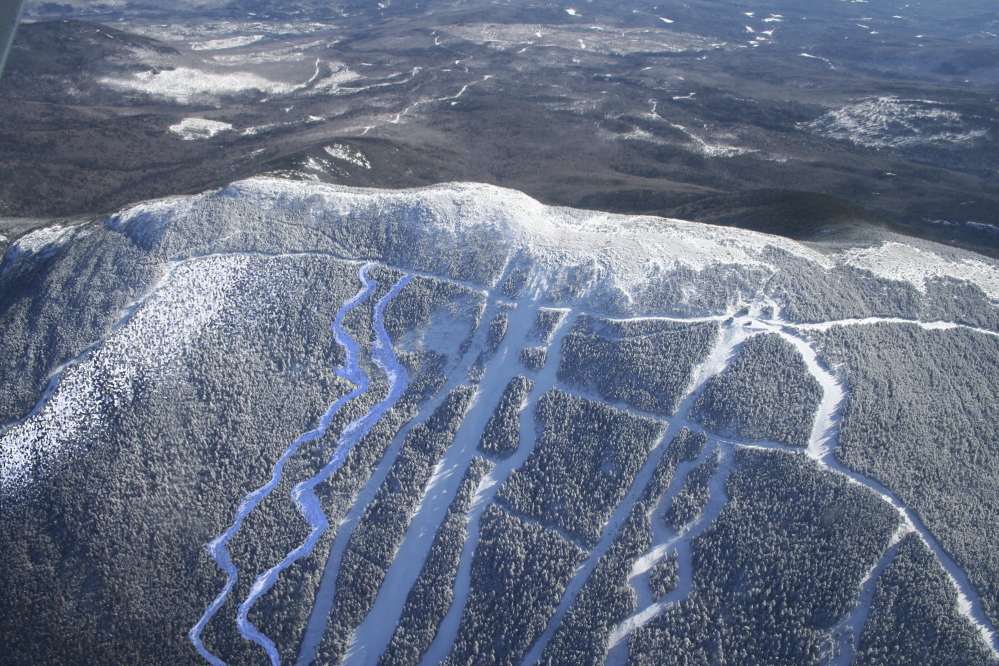 An aerial photo of the summit ski trails at Saddleback Maine ski area.