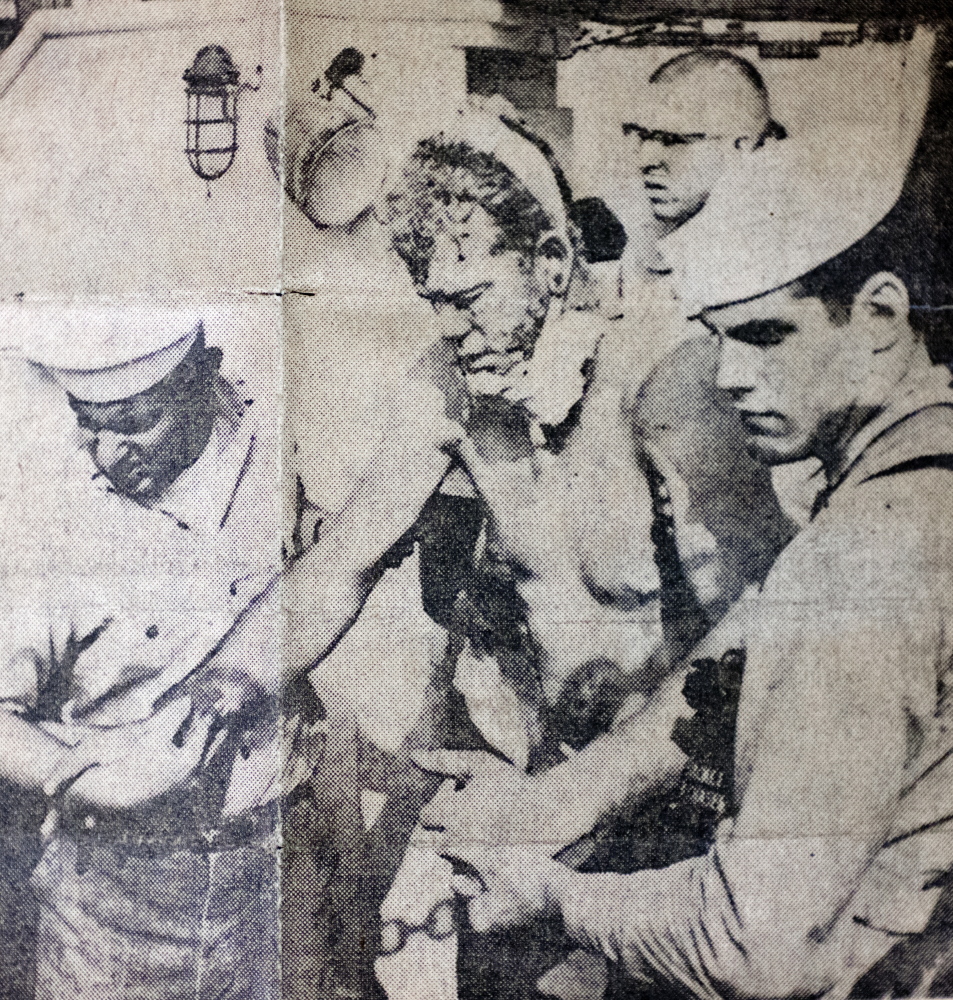 Peter Leavitt of Portland, shown being helped toward a stretcher at the Little Creek Coast Guard Station in Norfolk, Va., was one of the four crewman who survived.