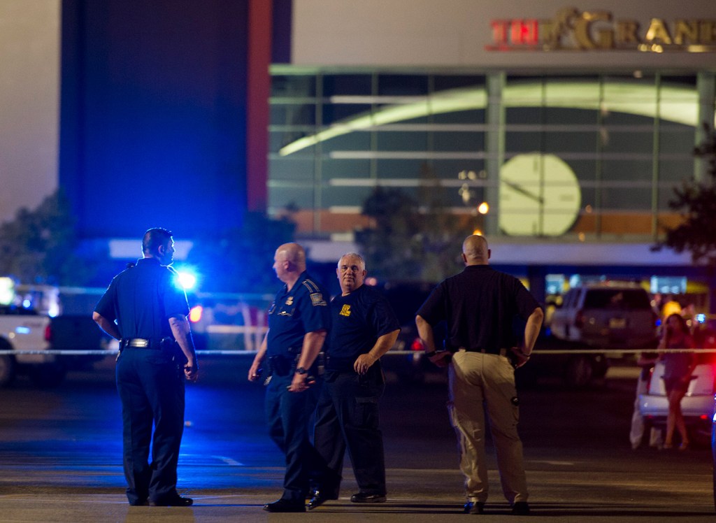 Police gather at The Grand Theatre following a deadly shooting in Lafayette, La., Thursday night.