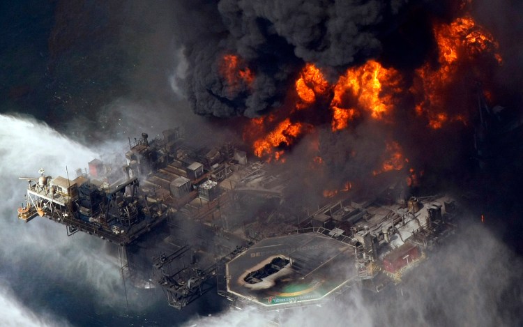 The Deepwater Horizon oil rig burns in the Gulf of Mexico, more than 50 miles southeast of Venice, La., in April 2010. The Associated Press