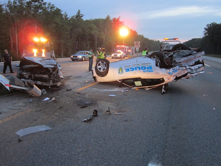 Police investigate a crash on I-95 southbound in Wells. Three were injured including 2 police officers. Photo courtesy of Wells Police Department