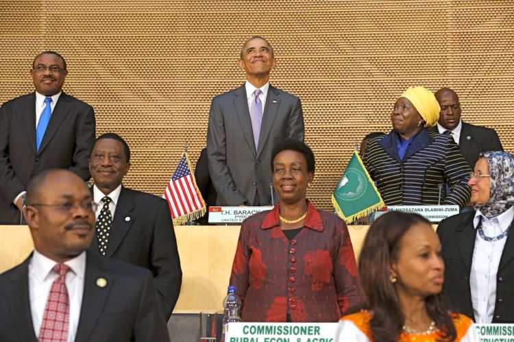President Obama, flanked by Ethiopia's Prime Minister Hailemariam Desalegn, top left, and African Union Chairwoman Nkosazana Dlamini-Zuma, arrives to deliver remarks at the African Union in Addis Ababa, Ethiopia, Tuesday. Reuters