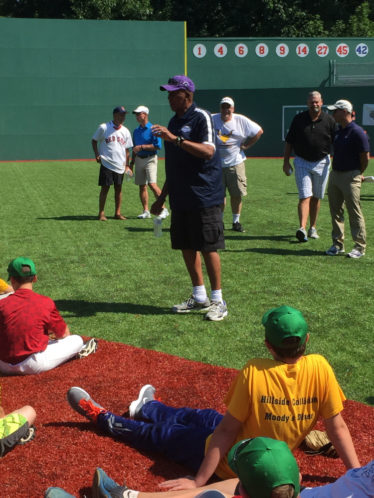 Major League Baseball Hall of Famer Ferguson Jenkins talks to players in August 2015 at Harold Alfond Fenway Park at Camp Tracy.