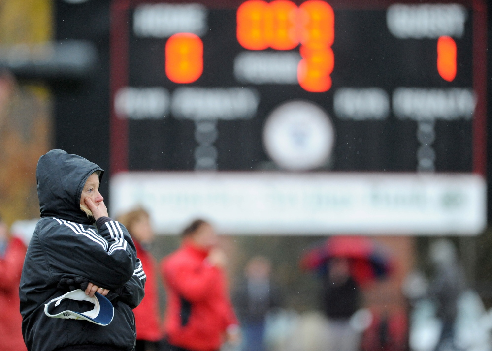 Staff file photo by Michael G. Seamans 
 Skowhegan Area High School field hockey head coachPaula Doughty watches as her team plays Scarborough in the Class A state title game last November. Doughty says the mandatory hands-off period is essential for players, coaches and families.