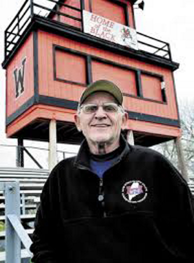 Harold “Tank” Violette stands on Poulin Memorial Field before he was inducted into the Maine Sports Hall of Fame in 2011. A University of Maine of graduate, Violette was one of just three Winslow football coaches since 1958. Violette died Tuesday.