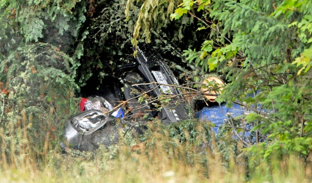 The bodies of Martin Poulin and Francine Dumas, both 58 and recently married, were found in this wreckage on U.S. Route 201 in West Forks Plantation by Poulin’s son and daughter Tuesday, one week after they crossed the border from Quebec. Family members had been looking for the couple since they didn’t return to Quebec Thursday.