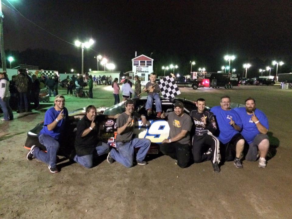 The team of Manchester’s Reid Lanpher celebrates after a recent win at Beech Ridge Motor Speedway in Scarborough.