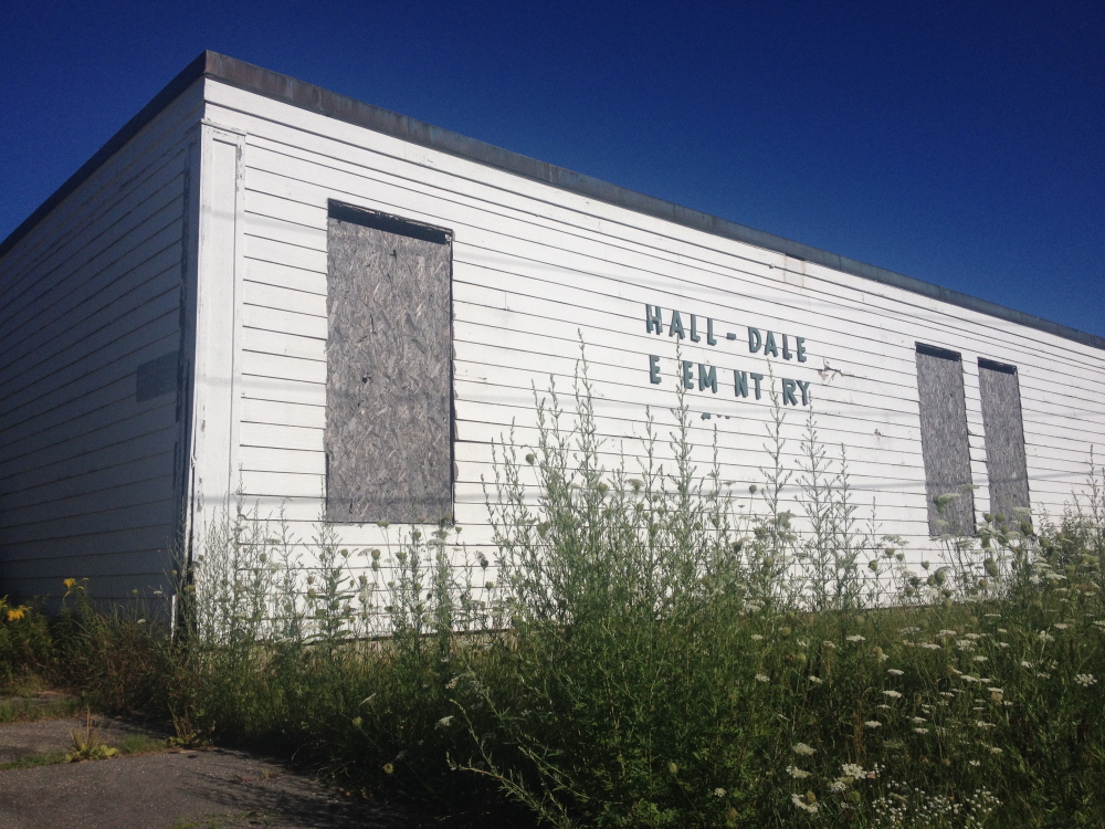 The windows are boarded up on Hall-Dale Elementary School on Sheldon Street in Farmingdale.