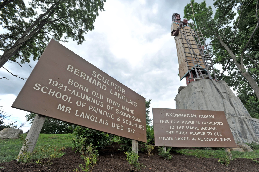 Langlais Park in Skowhegan, at the base of the Bernard Langlais Indian sculpture, will be dedicated in a ceremony Saturday. Skowhegan police are investigating an online threat, calling for the sculpture to be burned down in protest of those who want “Indians” removed as Skowhegan Area High School’s mascot.